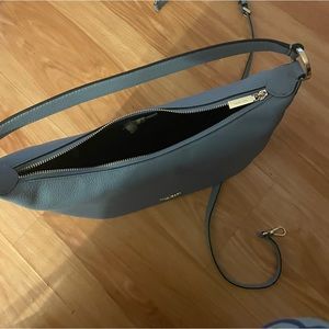 Kate Spade purse new with tags. It can be a shoulder bag or crossbody